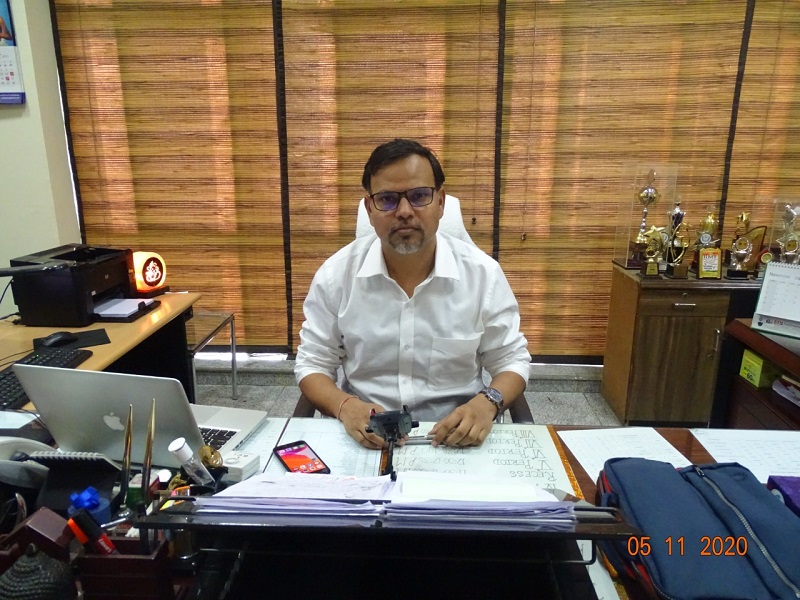 Dr. Neeraj Tandan